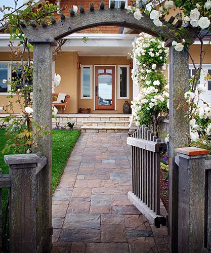 paver walkway leading up to house